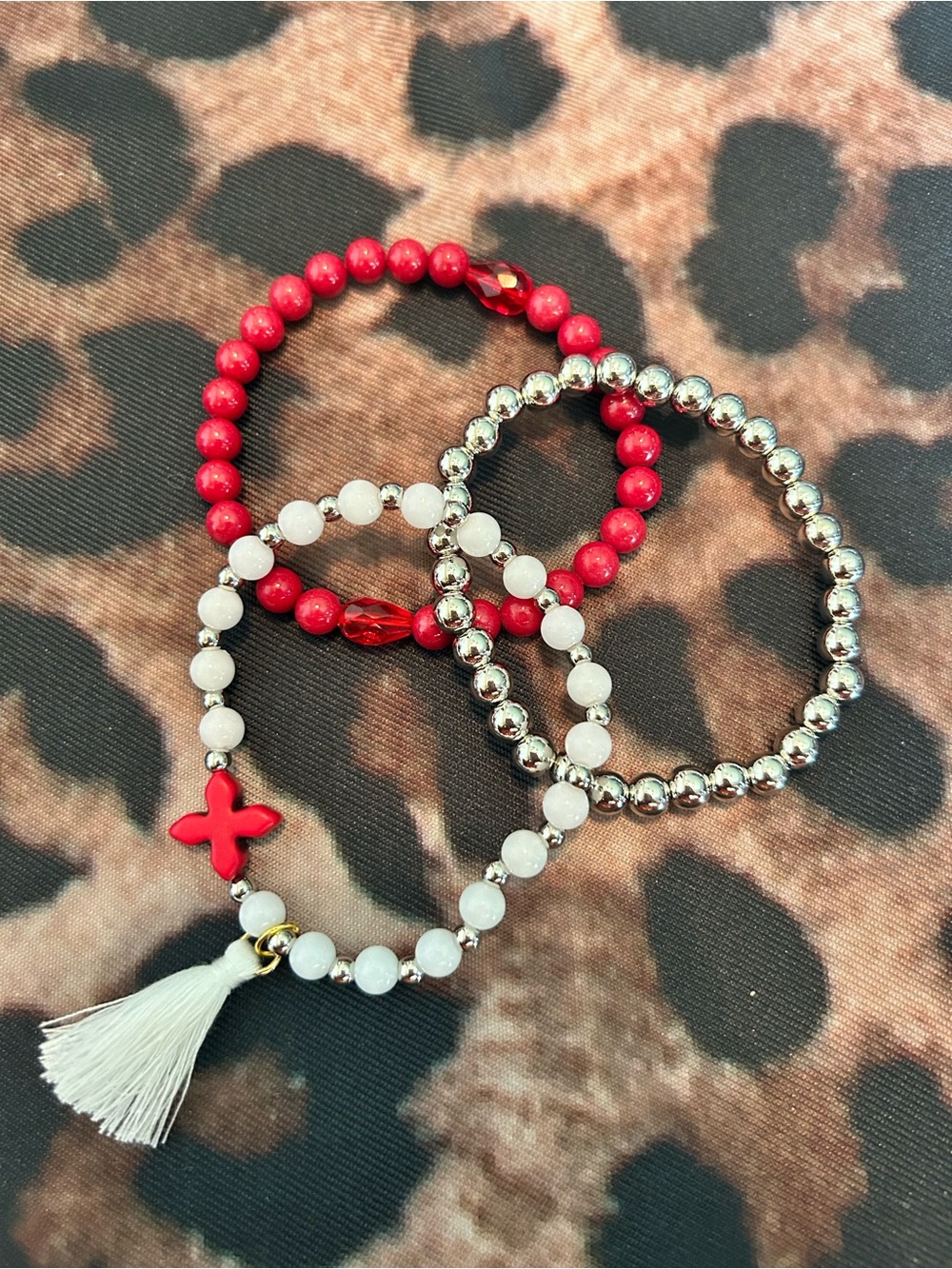 Red, White and Silver Beaded Bracelet Stack with White Tassel